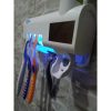 Dispensador Automatico de Pasta Dental con Esterilizador UV y Porta Cepillos